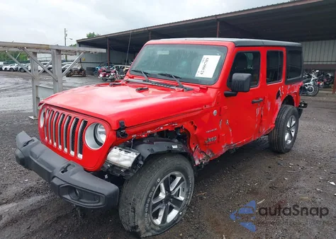 2021 Jeep Wrangler Unlimited Sahara 4X4 из США, поврежденный, VIN 1C4HJXENXMW592247